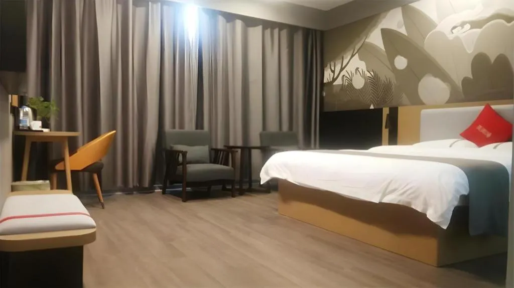 Bed in Thank Inn Hotel Guangxi Hechi Yizhou Sankeshu