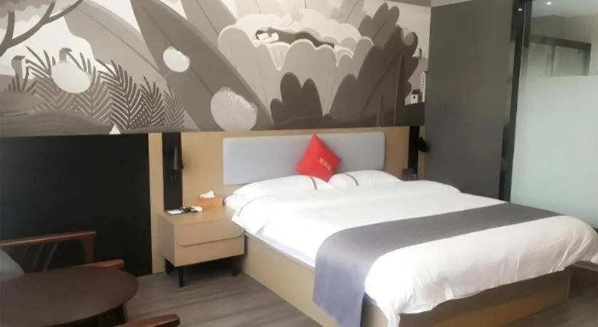 Bed in Thank Inn Hotel Guangxi Hechi Yizhou Sankeshu