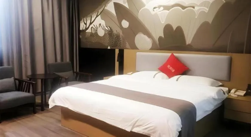 Bed in Thank Inn Hotel Guangxi Hechi Yizhou Sankeshu