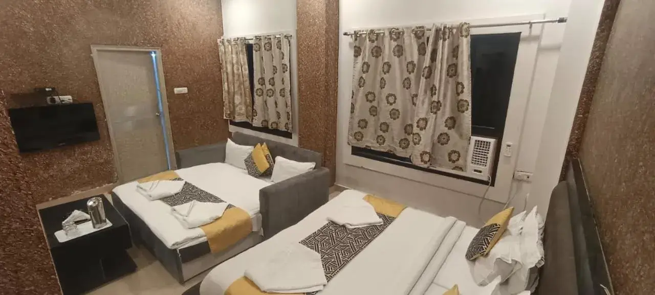 Photo of the whole room, Bed in HOTEL DEVA INN Photo of the whole room, Bed in HOTEL DEVA INN