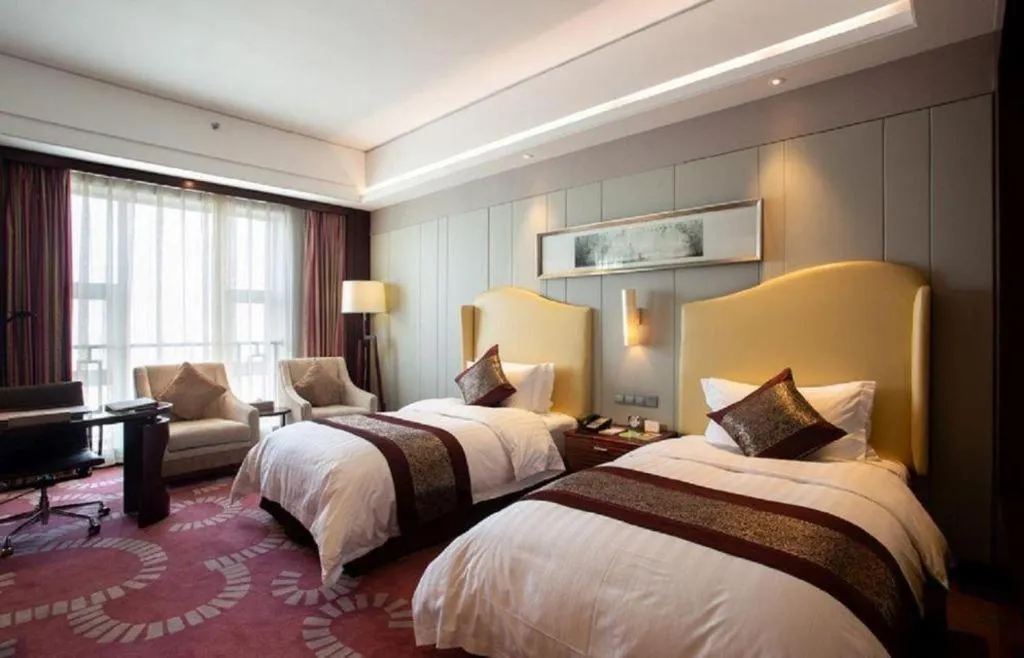 Bed in Bairun Zhenjiang International Hotel