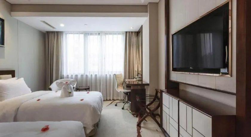 Bed in Xingtai Yuehai Hotel