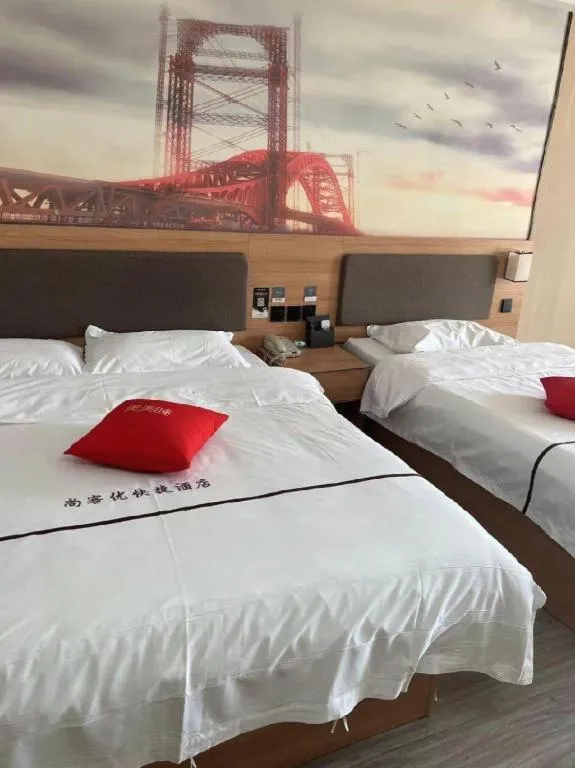 Bed in Thank Inn Hotel Shandong Heze Mudan District Bayi Road Pedestrian Street