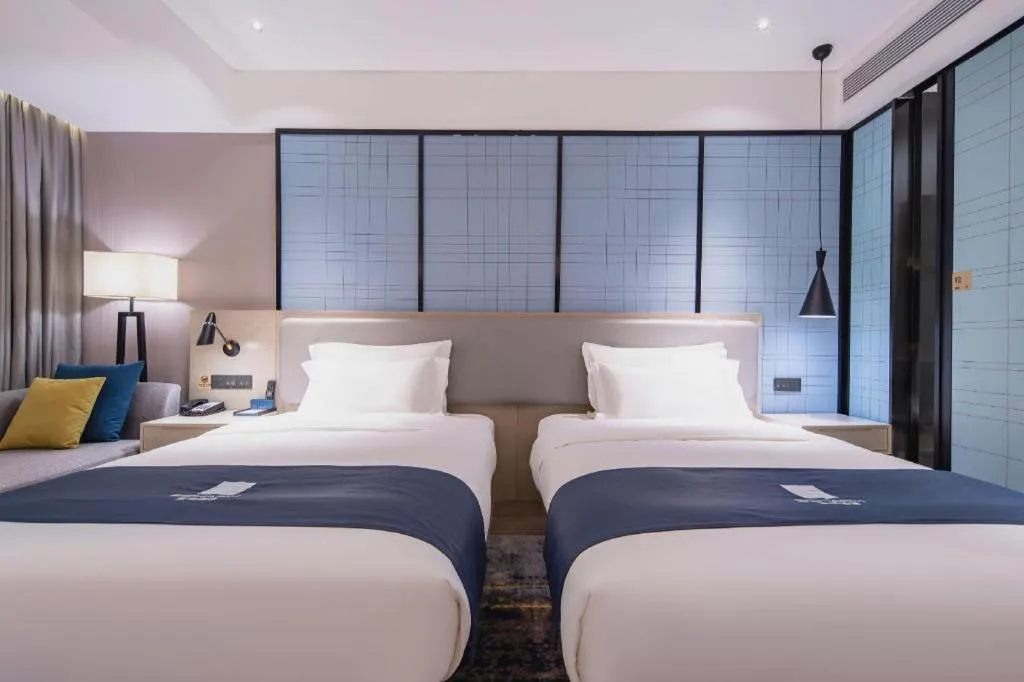 Bed in Echarm Hotel Nanning Wuming