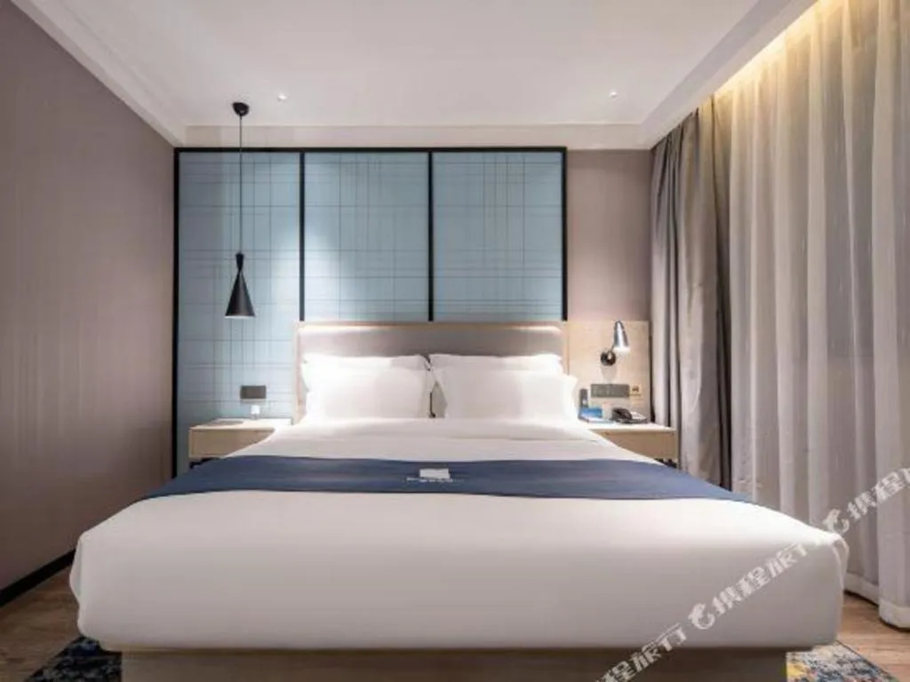 Bed in Echarm Hotel Nanning Wuming
