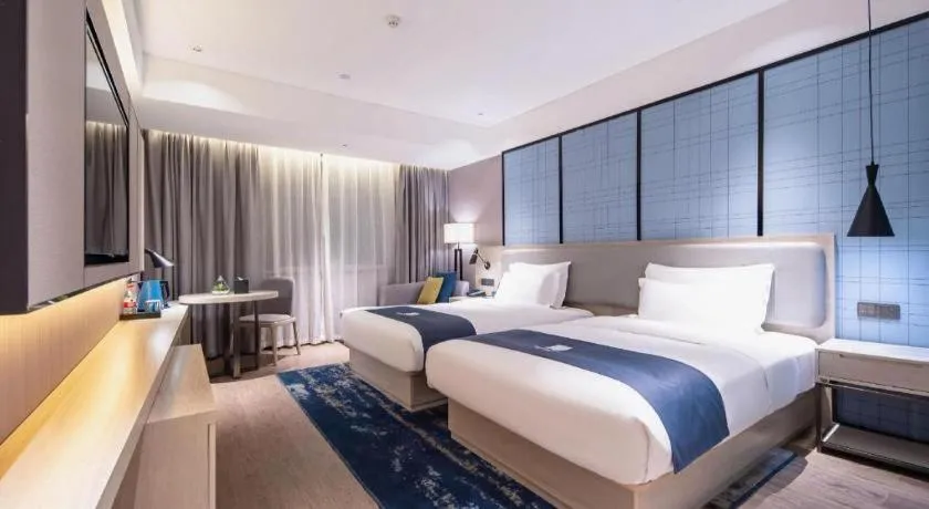 Bed in Echarm Hotel Nanning Wuming