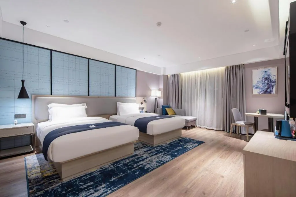 Bed in Echarm Hotel Nanning Wuming