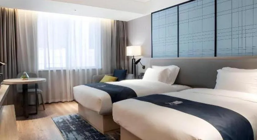 Bed in Echarm Hotel Nanning Wuming