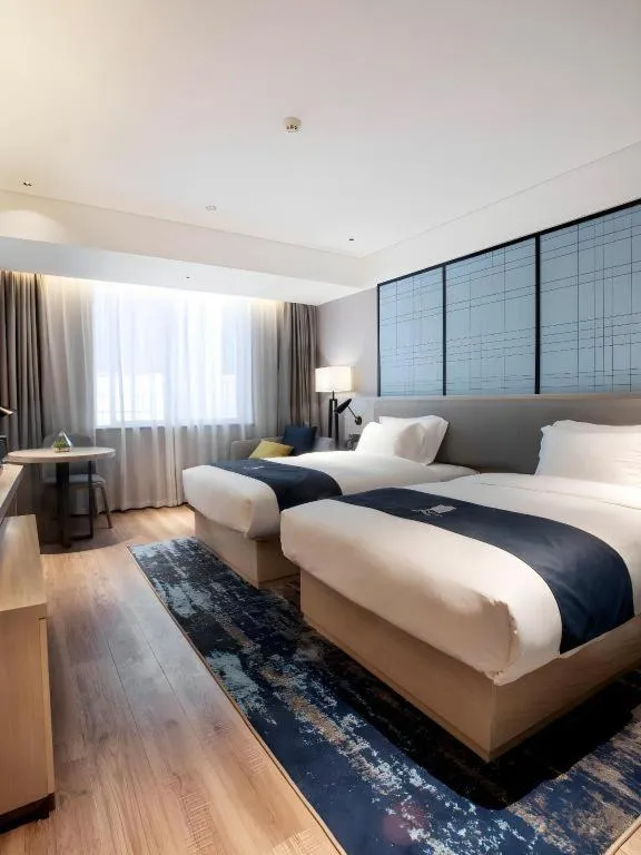 Bed in Echarm Hotel Nanning Wuming