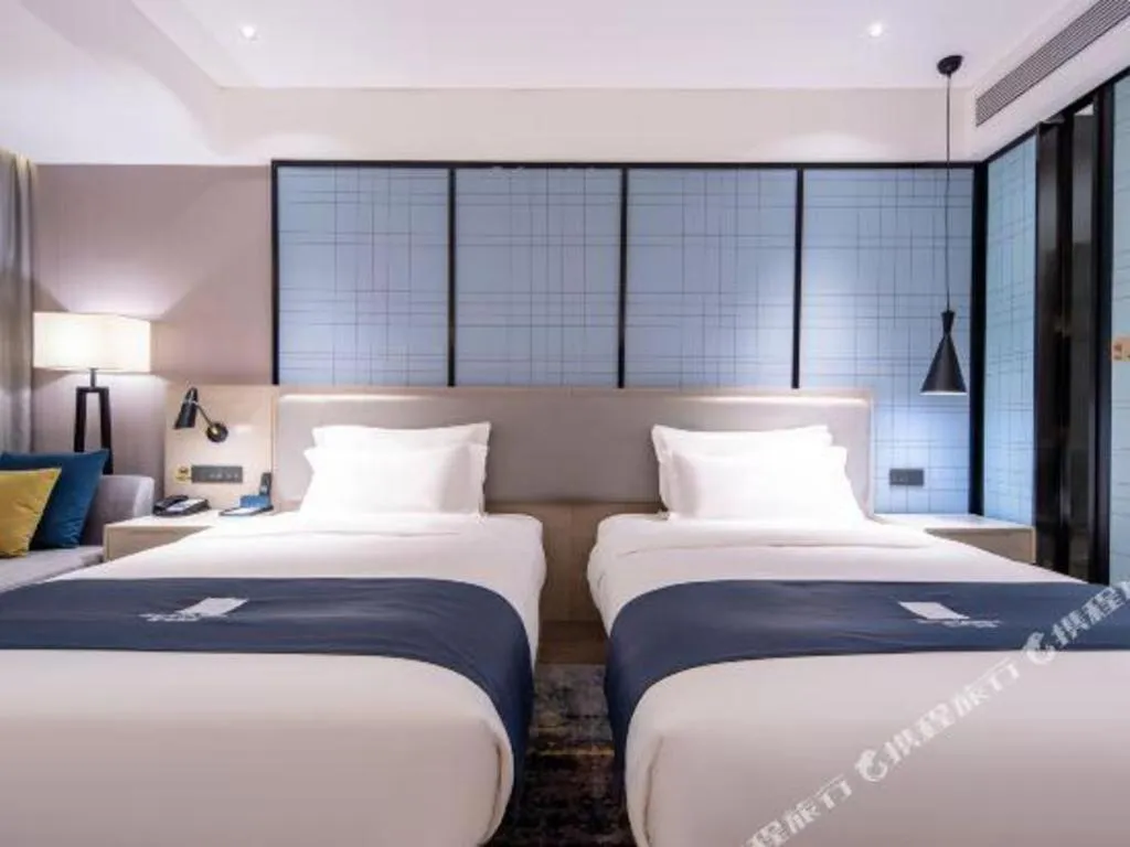 Bed in Echarm Hotel Nanning Wuming