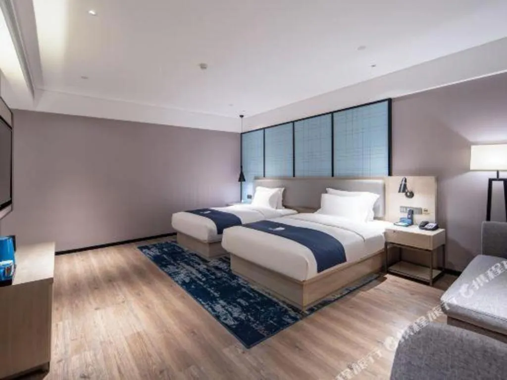 Bed in Echarm Hotel Nanning Wuming