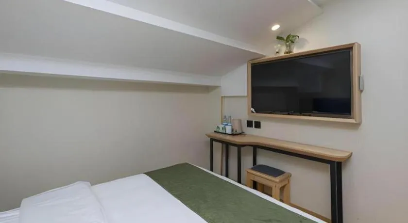 Bed in Green Tree Inn Express Beijing Xicheng District Dazhalan