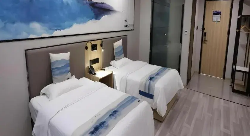 Bed in Green Tree Inn Express Jiangsu Taizhou Xinghua RT-Mart Bed in Green Tree Inn Express Jiangsu Taizhou Xinghua RT-Mart