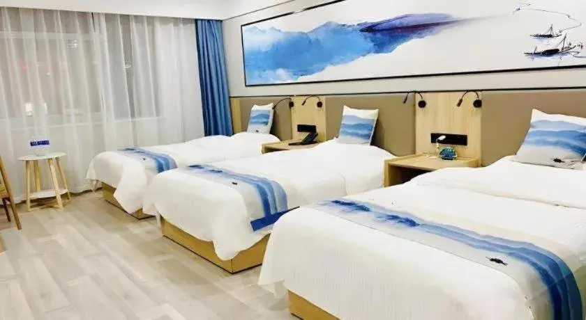 Bed in Green Tree Inn Express Jiangsu Taizhou Xinghua RT-Mart Bed in Green Tree Inn Express Jiangsu Taizhou Xinghua RT-Mart