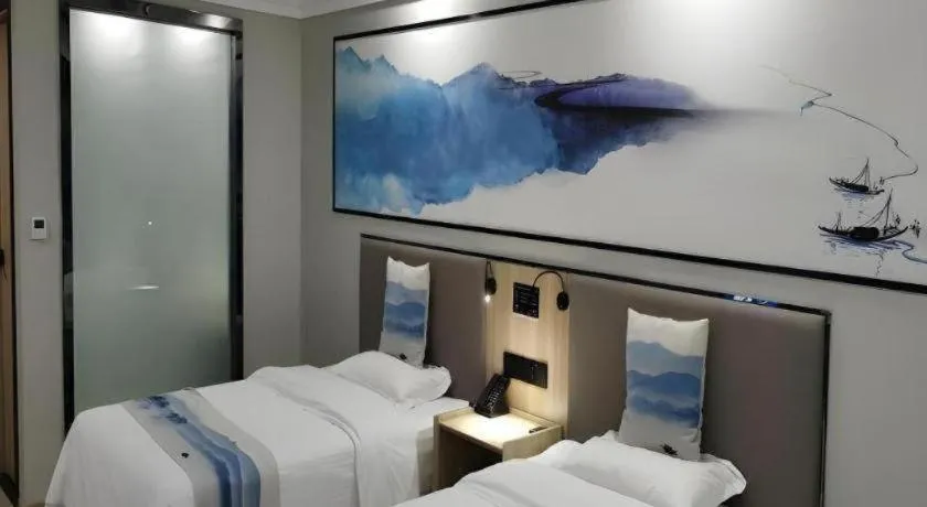 Bed in Green Tree Inn Express Jiangsu Taizhou Xinghua RT-Mart