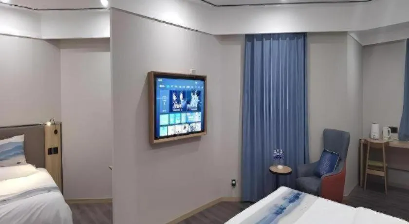 Bed in Green Tree Inn Express Jiangsu Taizhou Xinghua RT-Mart