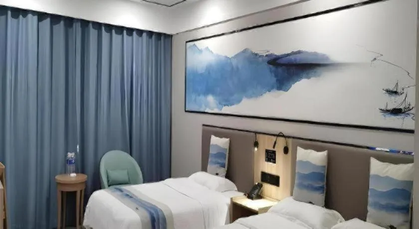Bed in Green Tree Inn Express Jiangsu Taizhou Xinghua RT-Mart