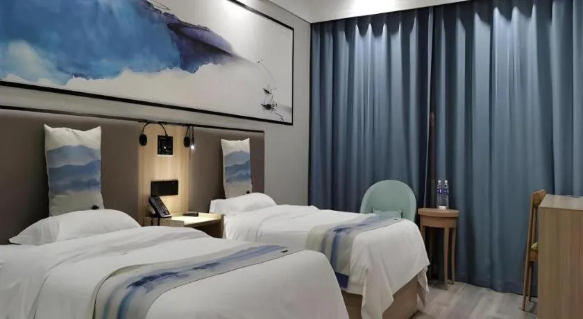 Bed in Green Tree Inn Express Jiangsu Taizhou Xinghua RT-Mart