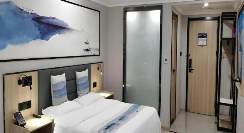 Bed in Green Tree Inn Express Jiangsu Taizhou Xinghua RT-Mart