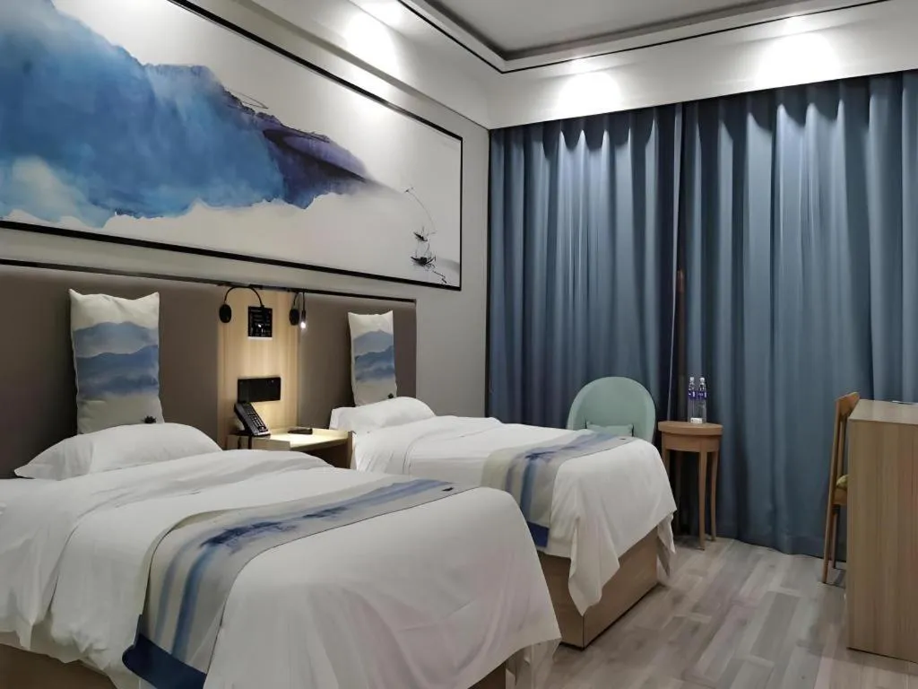 Bed in Green Tree Inn Express Jiangsu Taizhou Xinghua RT-Mart