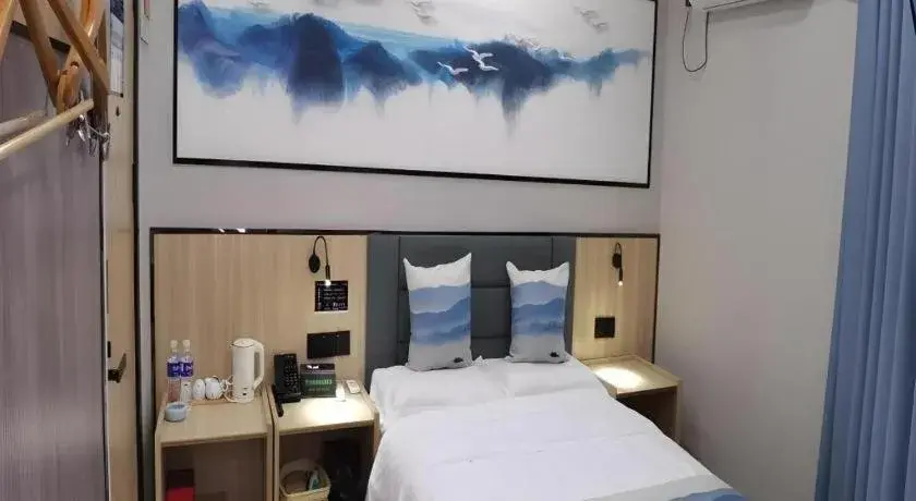 Bed in Green Tree Inn Express Jiangsu Taizhou Xinghua RT-Mart Bed in Green Tree Inn Express Jiangsu Taizhou Xinghua RT-Mart