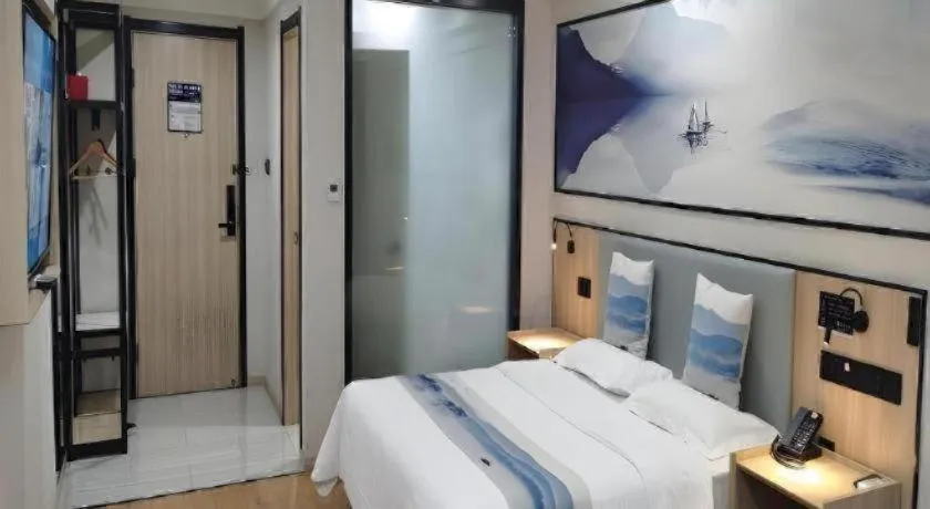 Bed in Green Tree Inn Express Jiangsu Taizhou Xinghua RT-Mart