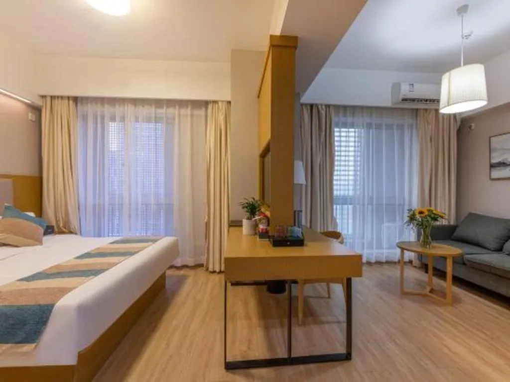 Bed in VX Hotel Wuxi Xinwu District Executive Center Wanda Plaza