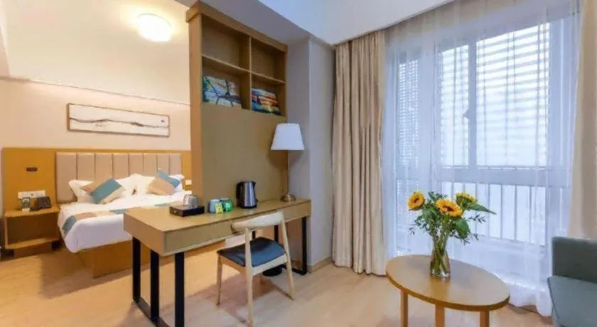 Bed in VX Hotel Wuxi Xinwu District Executive Center Wanda Plaza