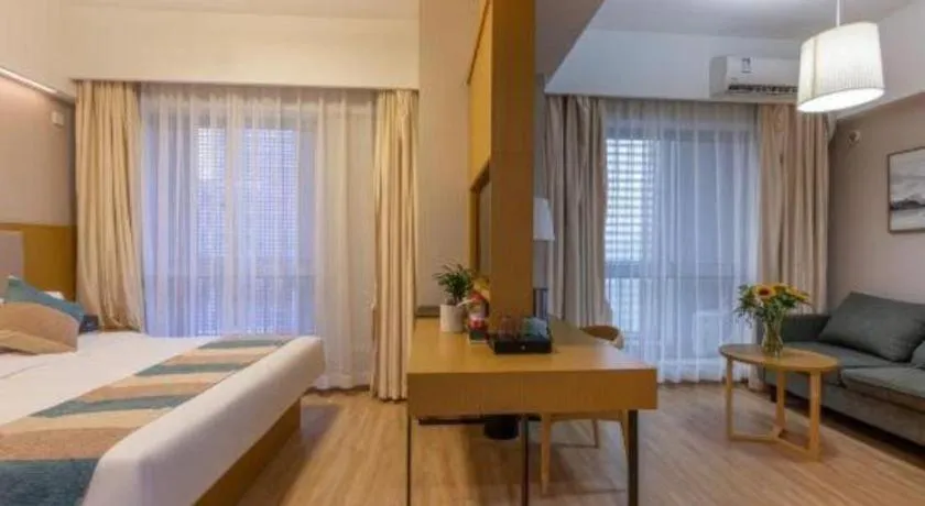 Bed in VX Hotel Wuxi Xinwu District Executive Center Wanda Plaza