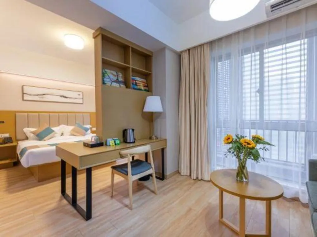 Bed in VX Hotel Wuxi Xinwu District Executive Center Wanda Plaza