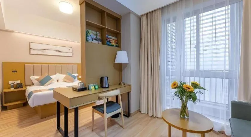 Bed in VX Hotel Wuxi Xinwu District Executive Center Wanda Plaza