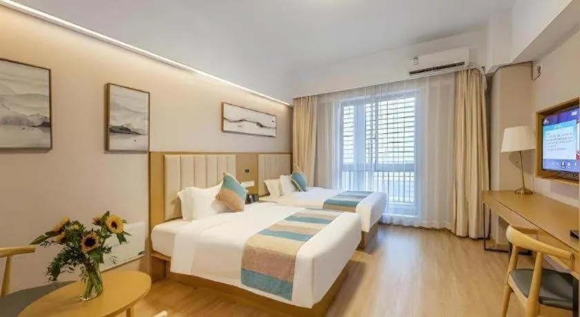 Bed in VX Hotel Wuxi Xinwu District Executive Center Wanda Plaza