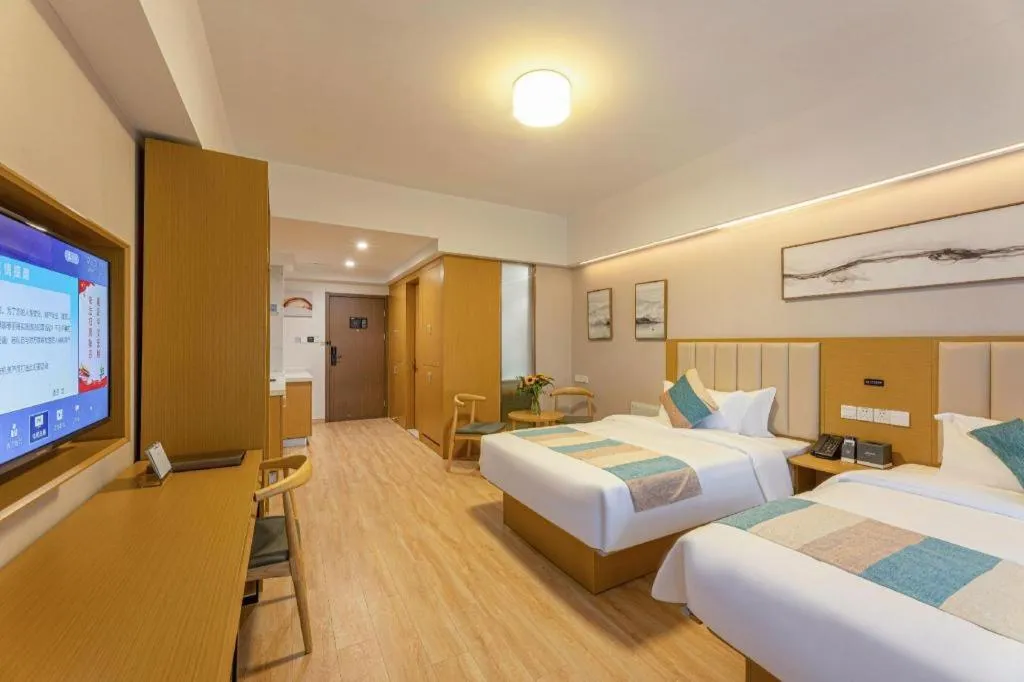 Bed in VX Hotel Wuxi Xinwu District Executive Center Wanda Plaza