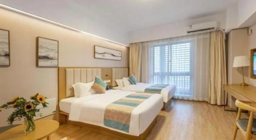 Bed in VX Hotel Wuxi Xinwu District Executive Center Wanda Plaza