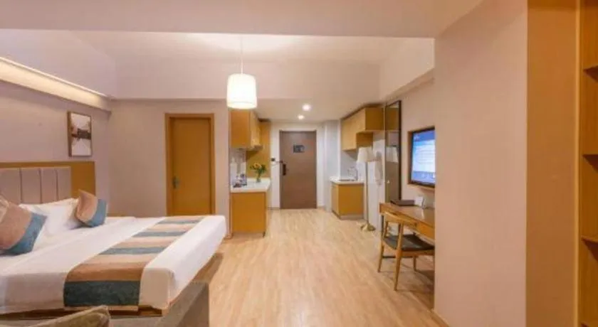 Bed in VX Hotel Wuxi Xinwu District Executive Center Wanda Plaza