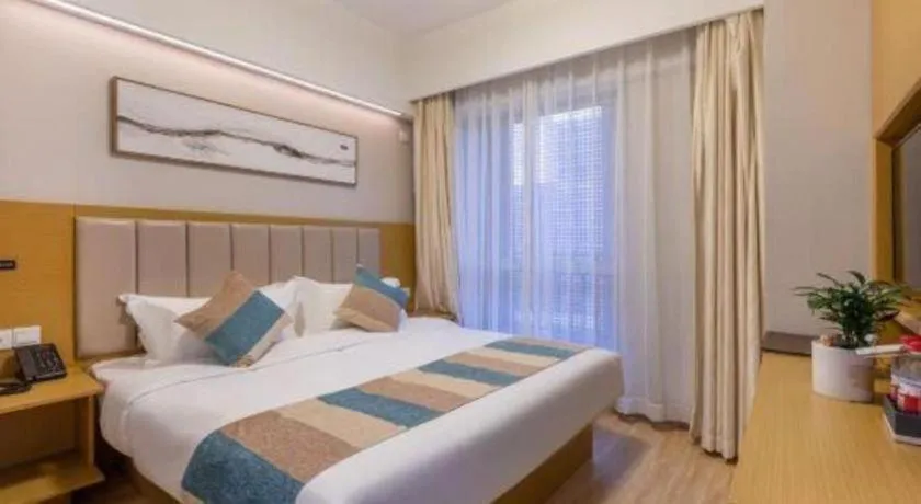 Bed in VX Hotel Wuxi Xinwu District Executive Center Wanda Plaza