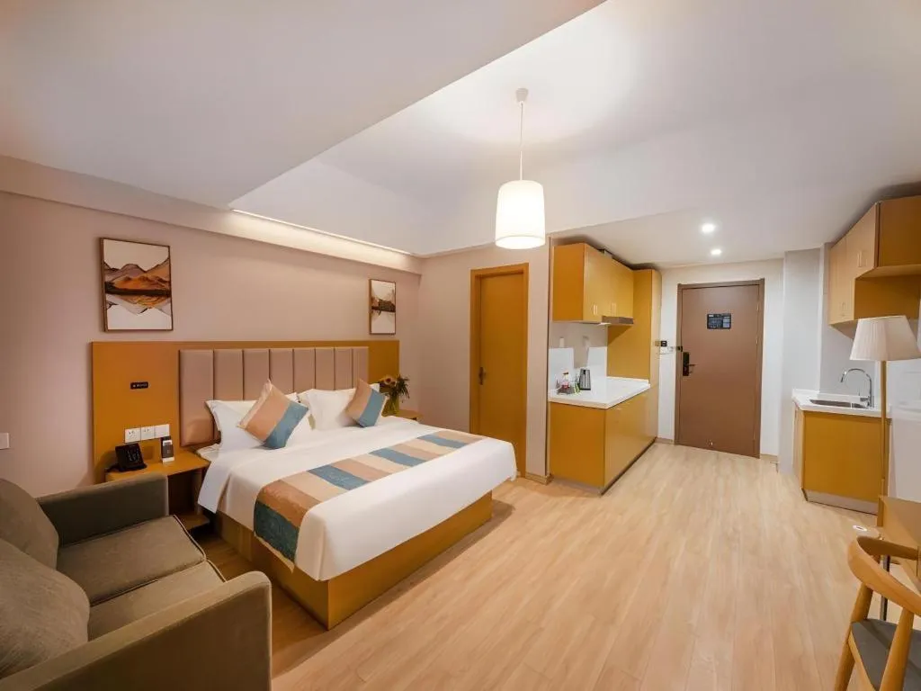 Bed in VX Hotel Wuxi Xinwu District Executive Center Wanda Plaza
