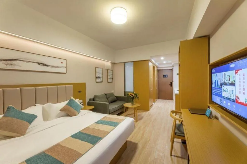 Bed in VX Hotel Wuxi Xinwu District Executive Center Wanda Plaza