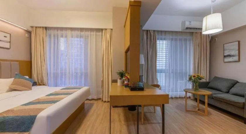 Bed in VX Hotel Wuxi Xinwu District Executive Center Wanda Plaza