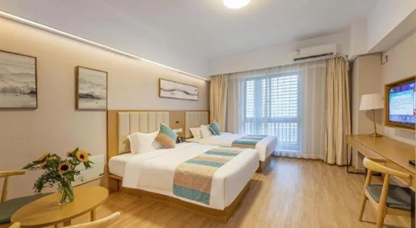 Bed in VX Hotel Wuxi Xinwu District Executive Center Wanda Plaza