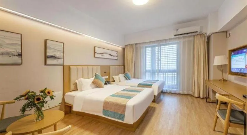 Bed in VX Hotel Wuxi Xinwu District Executive Center Wanda Plaza