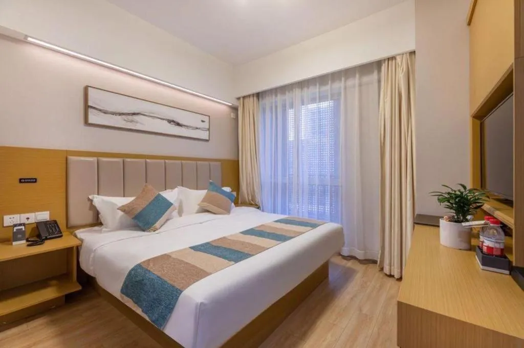 Bed in VX Hotel Wuxi Xinwu District Executive Center Wanda Plaza