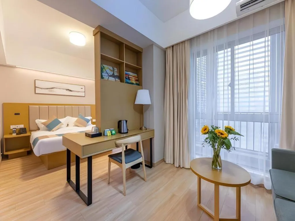 Bed in VX Hotel Wuxi Xinwu District Executive Center Wanda Plaza