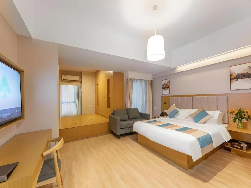 Bed in VX Hotel Wuxi Xinwu District Executive Center Wanda Plaza