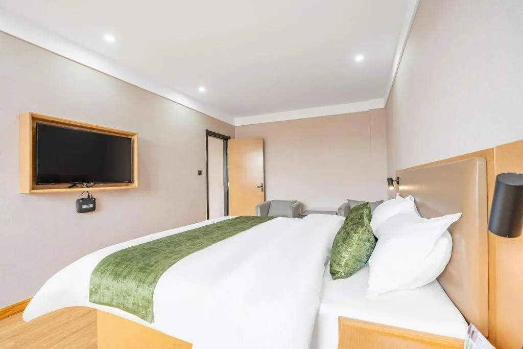 Bed in Green Tree Inn Express Weifang Zhucheng Longyuan Shangcheng