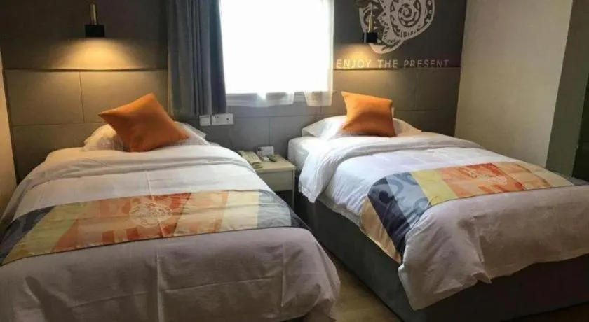 Bed in Shell Hotel Shanghai Minhang District Wenjing Road Metro Station