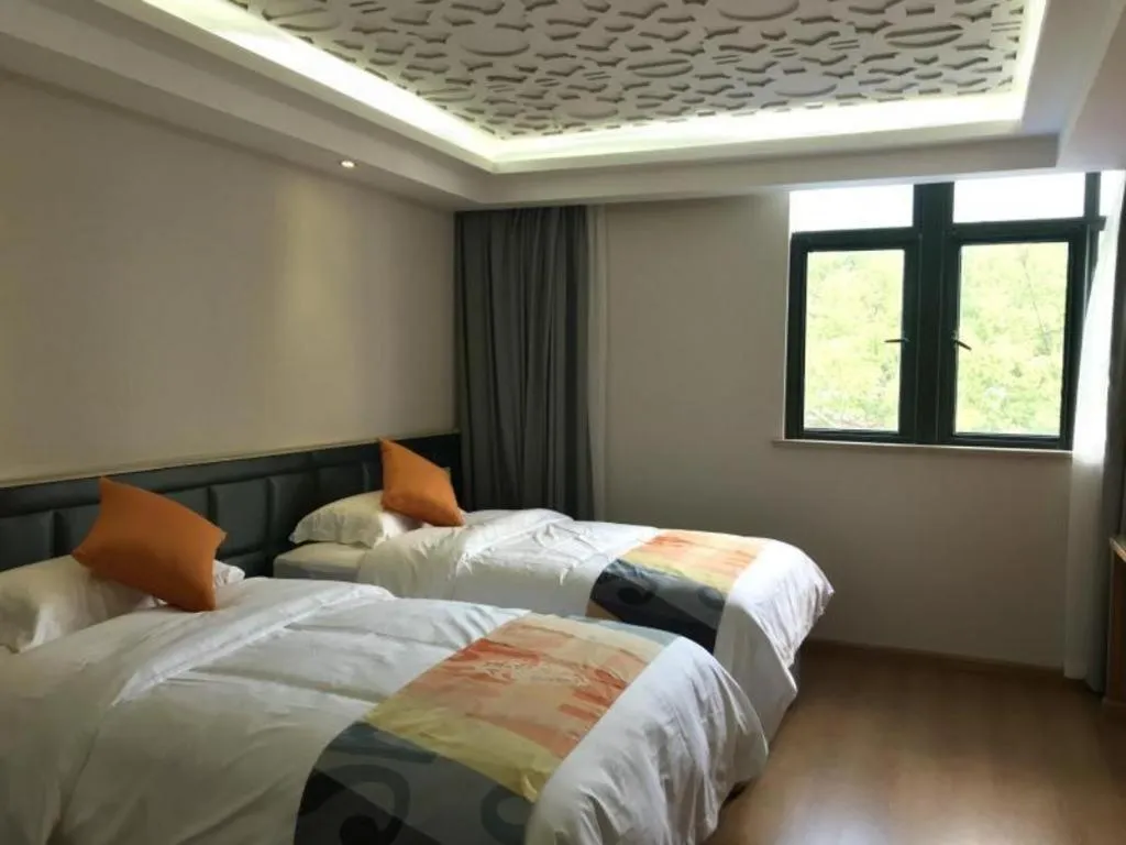 Bed in Shell Hotel Shanghai Minhang District Wenjing Road Metro Station