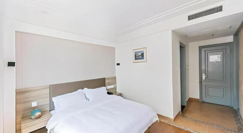 Bed in GreenTree Alliance Hotel Shanghai Baoshan District Meilan Lake Yueluo Road