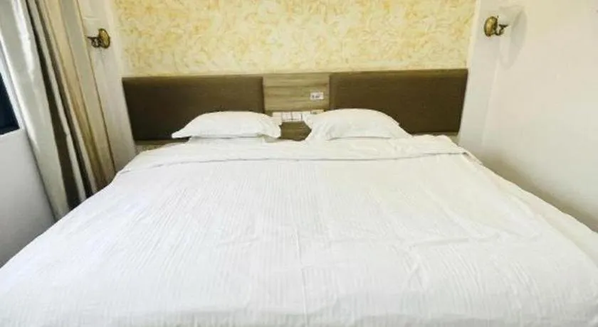 Bed in GreenTree Alliance Hotel Shanghai Baoshan District Meilan Lake Yueluo Road