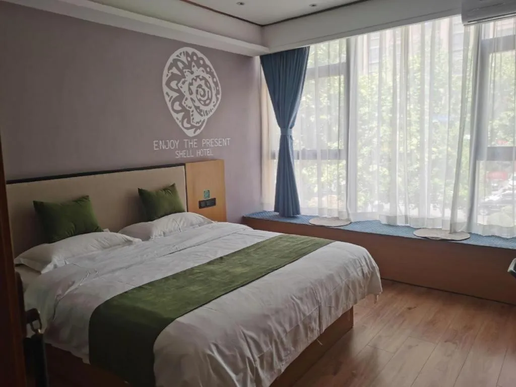 Bed in Shell Hotel Anhui Huaibei Railway Station Huiyuan Road